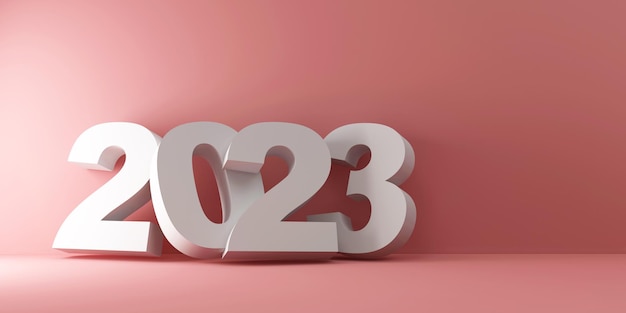 2023 Neujahrssymbol in der Nähe der Wand auf rosa Studiohintergrund