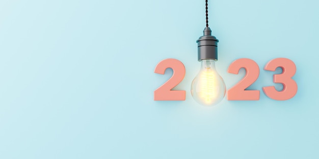 2023 sinal com lâmpada brilhante pendurada no fundo azul