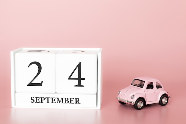 24 de setembro. dia 24 do mês. cubo de calendário com carro