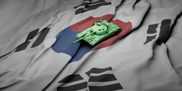 Foto 3d-illustration eines spielzeug-grünen tanks über der welligen flagge südkoreas in einer düsteren umgebung mit unklarheit