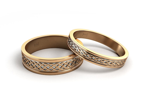 3D Render Anillos de boda de oro grabados aislado en blanco