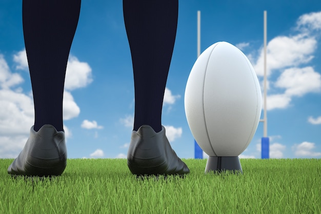 3D-Rendering Rugbyball mit Rugby-Posts auf dem Feld