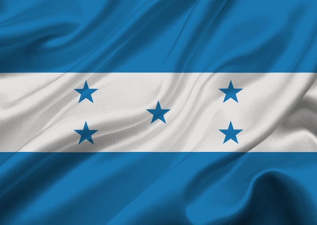 A bandeira de Honduras a agitar no vento.