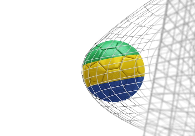 A bola de futebol da bandeira do Gabão marca um gol em uma rede