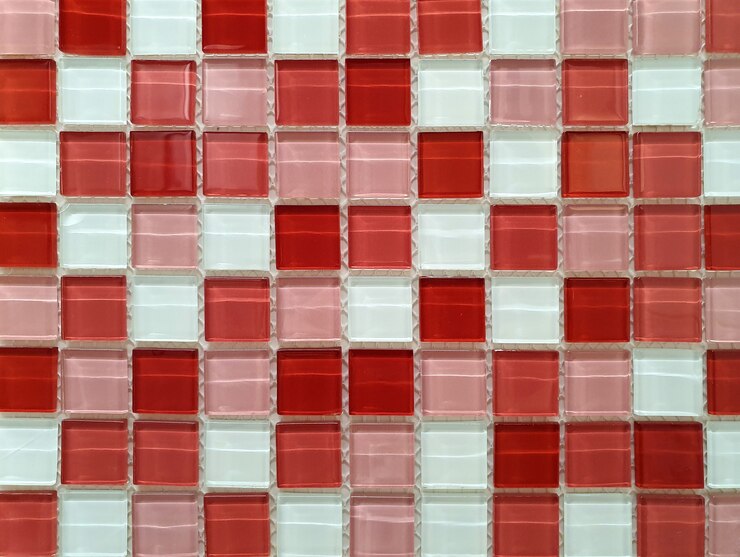 Foto a parede ou o chão são decorados com azulejos coloridos.