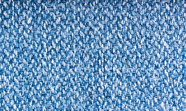A tela do tecido de lã é azul. Vista superior, textura de tecido.
