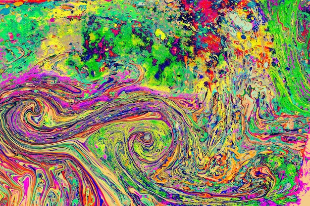 A textura abstrata do fundo da arte do grunge com pintura colorida espirra