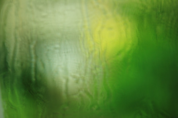 Foto a textura das gotas de chuva no vidro da janela