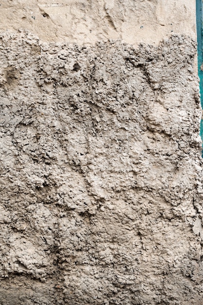 A textura das velhas paredes de concreto cinza para plano de fundo, superfície e padrão de cimento cinza.