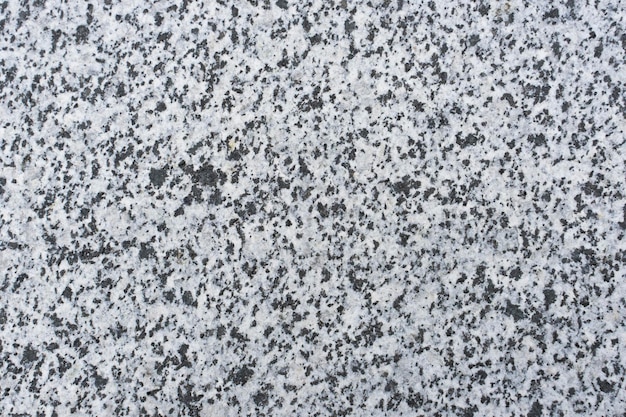 A textura do mármore é granulada perto do cinza