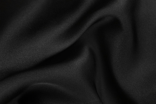 A textura lisa e elegante de seda ou cetim pode ser usada como fundo abstrato. Design de plano de fundo luxuoso