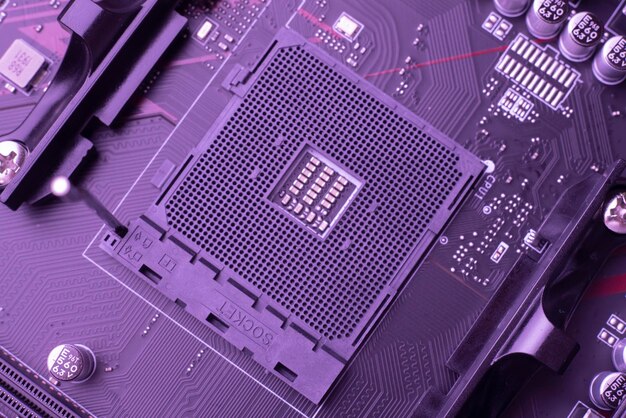 A visão macro o novo soquete de computador vazio na placa-mãe para processador central ou cpu