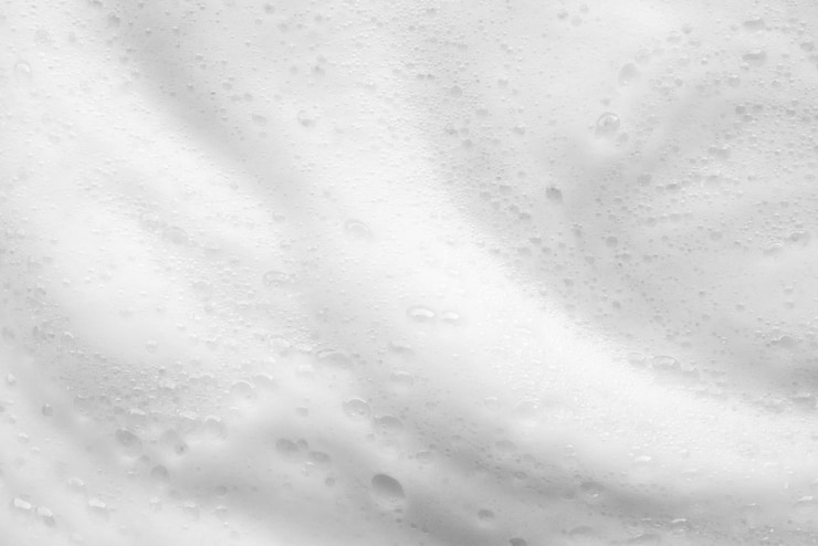 Foto abaixo da textura de bolhas de espuma de sabão branco abstrato