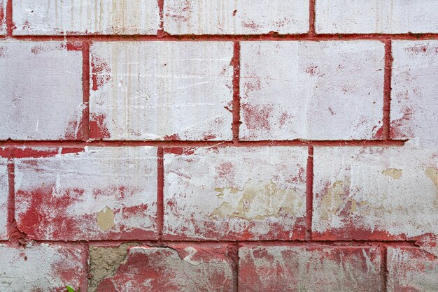 Abblätternde Farbe auf dem Hauswandhintergrund