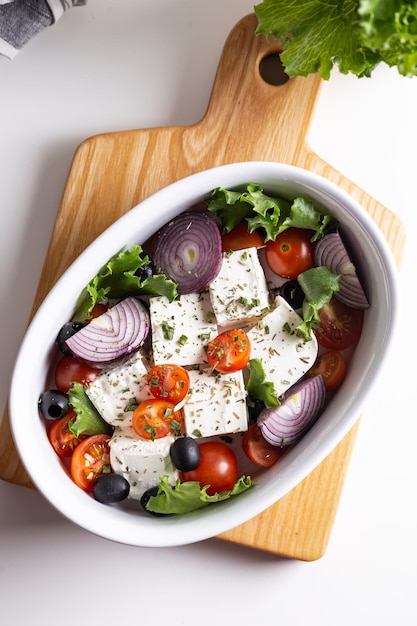 Abendessen mit gebackenem griechischem Feta-Käse