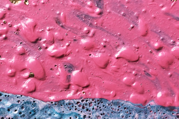 Abstração de tinta de bolha de arte fluida Fundo de tinta rosa esburacada tátil ou textura fechada