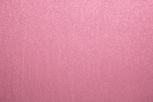 Abstract pink background Eine leere flache Oberfläche mit einer feinen Textur