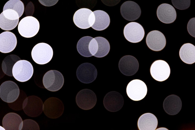 Abstracto borrón vacaciones bokeh fondo muchas luces redondas en el fondo