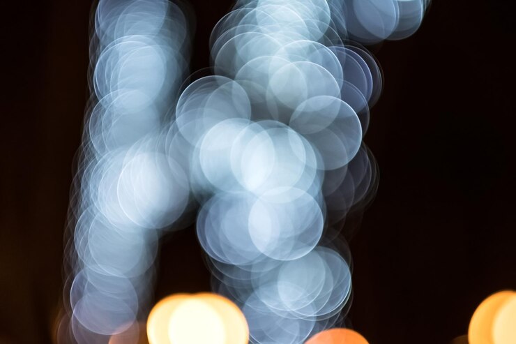 Foto abstracto borroso bokeh colorido en la noche para uso de fondo