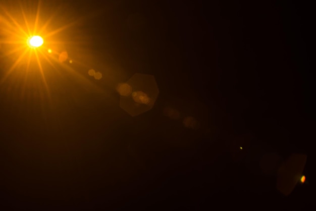 Abstracto Flare solar natural no preto
