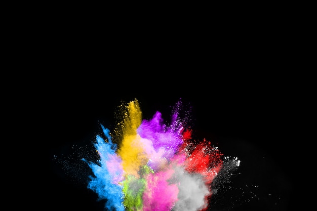 abstrakte farbige Staubexplosion auf einem schwarzen Hintergrund.