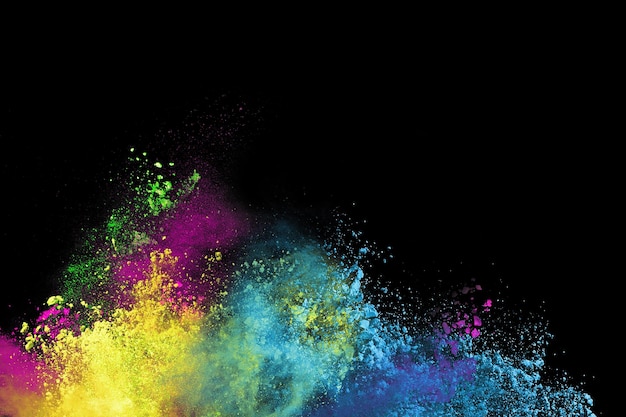 Foto abstrakte farbige staubexplosion auf einem schwarzen hintergrund.