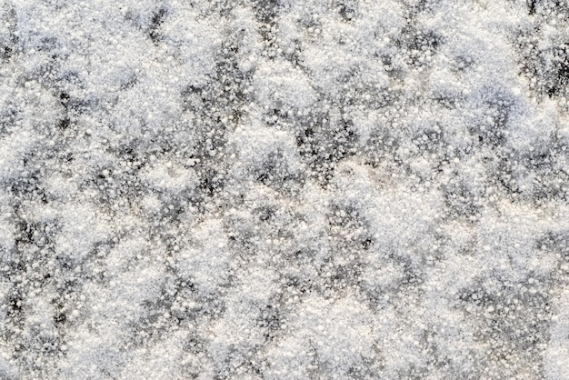 Abstrakte holprige Textur einer Winterschneeverwehung für natürliche Hintergründe und für Tapeten