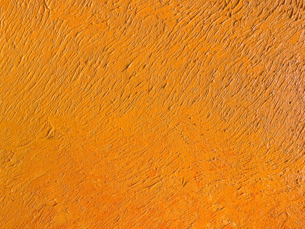 Abstrakte Kunst Hintergrund dunkel orange Farben Aquarellmalerei auf Leinwand mit roten Pinselstrichen Fragment von Kunstwerken auf Papier mit Ingwer-Muster Textur Hintergrund Makro