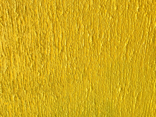 Abstrakte Kunst Hintergrund leuchtend gelbe Farben Aquarellmalerei auf Leinwand mit goldenen Pinselstrichen