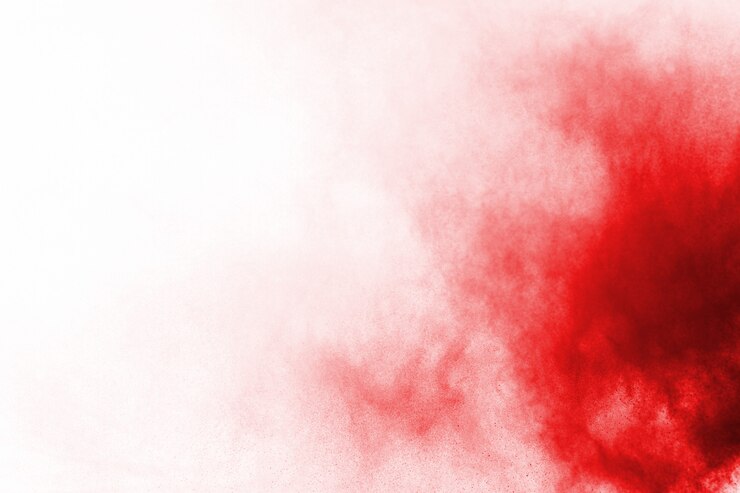 abstrakte rote Staubexplosion auf weißem Hintergrund.