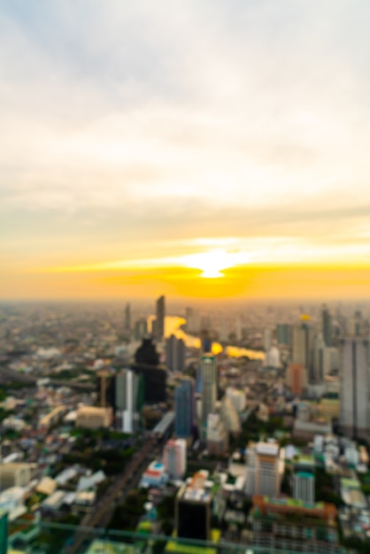 abstrakte Unschärfe Bangkok Stadtbild in Thailand mit Sonnenuntergang Himmel