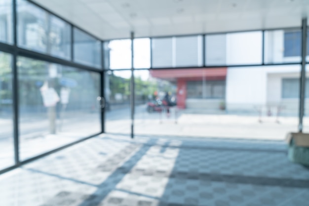 abstrakte Unschärfe leeres Büro mit Glasfenster und Sonnenlicht für den Hintergrund