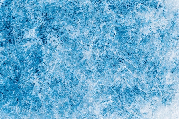 Abstrakter Eisfrost natürlicher Hintergrund mit Raureifkristallen