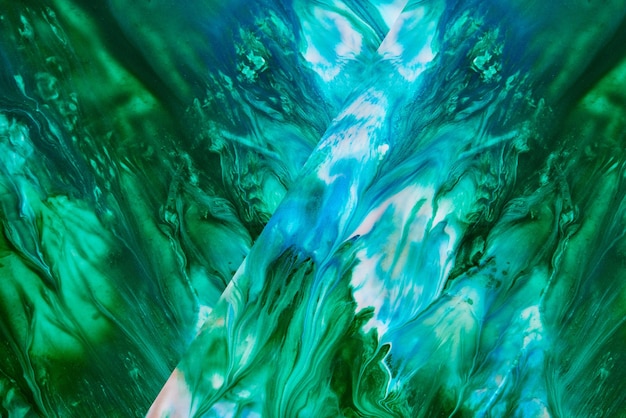 Abstrakter flüssiger blaugrüner Musterhintergrund Kosmische Meereswellen Farbflecken kreative flüssige Kunst Farben des Planeten Erde