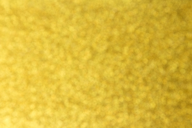 Abstrakter goldener bokeh Hintergrund für Weihnachten, Feierkonzept.