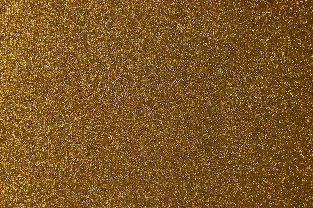 Abstrakter goldener luxuriöser festlicher Glamour-Glitter-Textur-Hintergrund funkelt