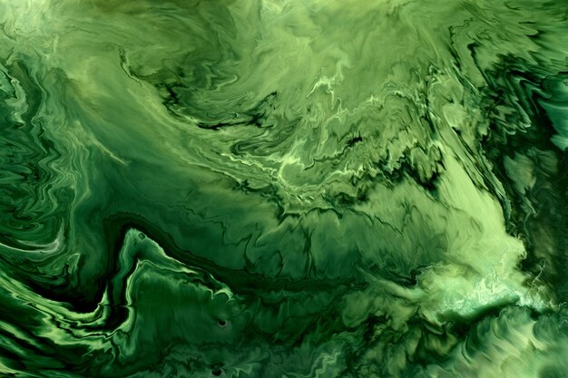Abstrakter grüner Farbhintergrund Mehrfarbige flüssige Kunst Wellen spritzen und flecken Acryl-Alkohol-Tintenfarben unter Wasser