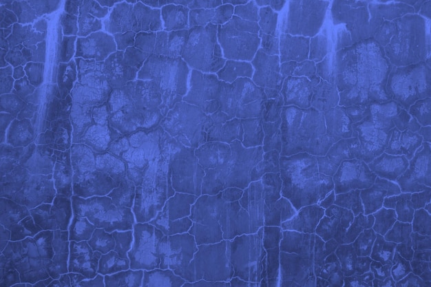Abstrakter Hintergrund der blauen Schmutzbetonwand