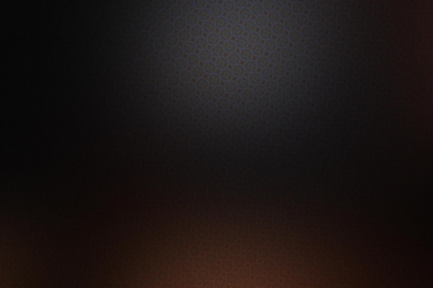 Abstrakter Hintergrund mit bokeh-defokussierten Lichtern in schwarzen und orangefarbenen Farben