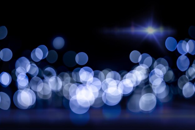 Abstrakter leuchtender blauer Bokeh-Hintergrund - Glitzer, Wunderkerze, Weihnachten, Hochgeschwindigkeit, Lichtgeschwindigkeit