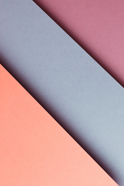 Foto abstrakter orange blau-violetter farbpapiergeometrie-zusammensetzungshintergrund, minimalistische schatten, kopienraum. minimale geometrische formen. buntes hintergrundkonzept