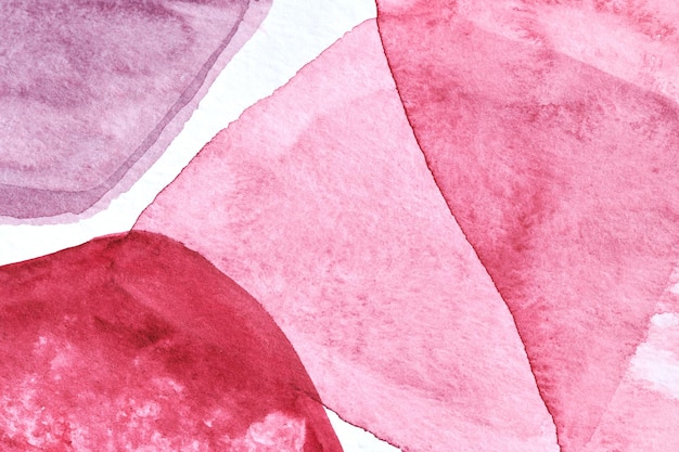 Abstrakter roter Hintergrund. Kunstcollage mit Aquarelltinte. Flecken und Pinselstriche aus Acrylfarbe