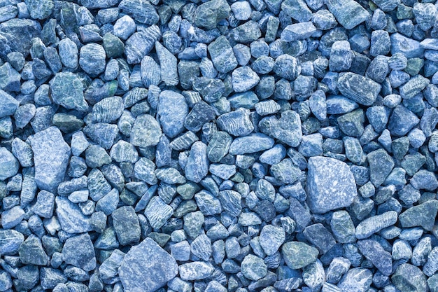 Abstrakter Texturhintergrund frisch zerquetschter blauer zerquetschter Stein