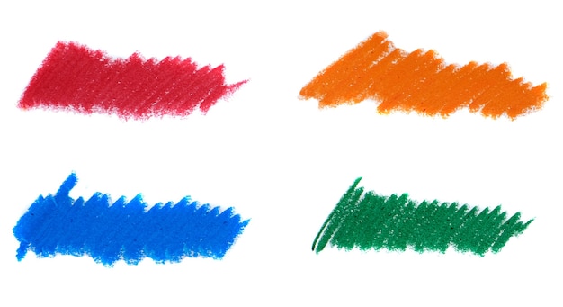 Abstrakter Zeichenstift auf weißem Hintergrund. Blaue, orange, grüne und rote Kreide-Kritzel-Textur. Wachspastellfleck.