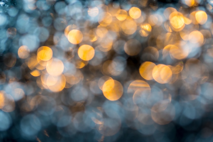 Foto abstraktes gold und weißer bokeh hintergrund