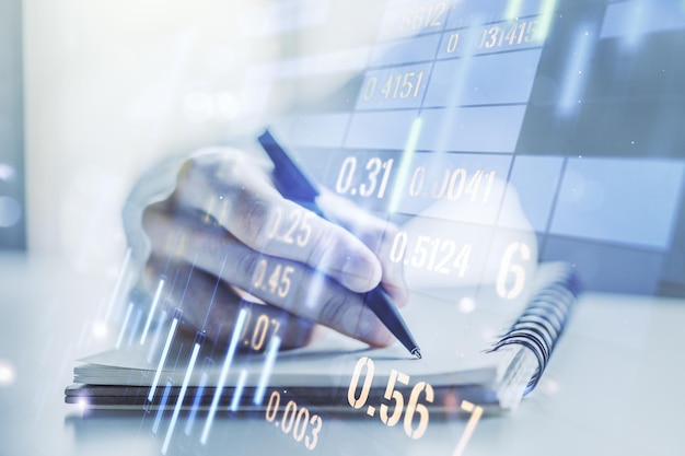Abstraktes kreatives Finanzdiagramm mit Handschrift im Tagebuch zum Hintergrundfinanz- und Handelskonzept Mehrfachbelichtung