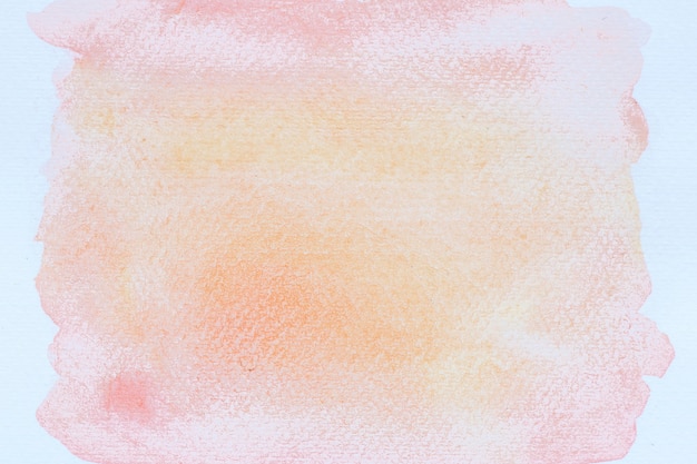 Foto abstraktes rosa aquarell auf weißem hintergrund.