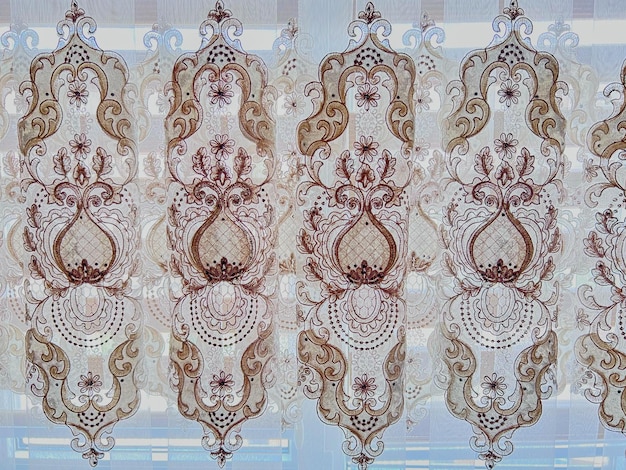 Abstraktes symmetrisches Muster auf dem Vorhang