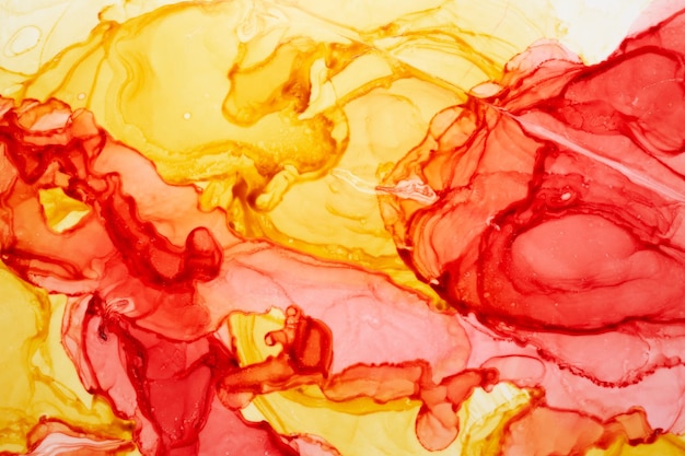 Abstrato base aquarela amarelo vermelho. Manchas de tinta e manchas onduladas na água, papel de parede de luxo fluido de arte líquida laranja