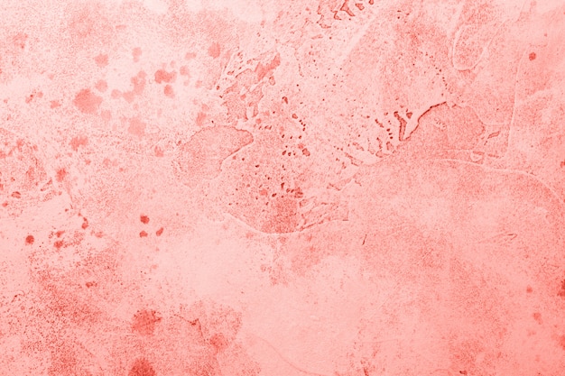 Abstrato base de cimento concreto. Textura grunge, papel de parede. Cor coral viva do ano de 2019. Vista superior, copie o espaço.
